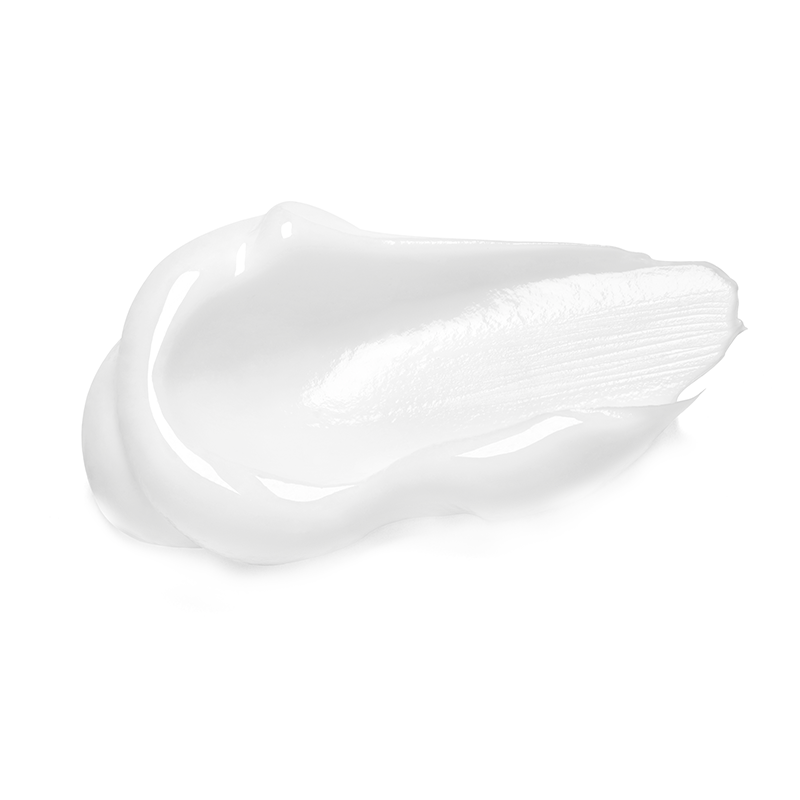 Close-up of a white moisturiser cream smear